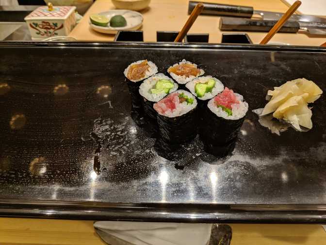 Hand rolls, which I was instructed to dip into my soy sauce. They were lighter
than I'm used to, so that's a win, although I'm still not a big fan of them
relative to the nigiri pieces. I understand that it's pretty standard though.