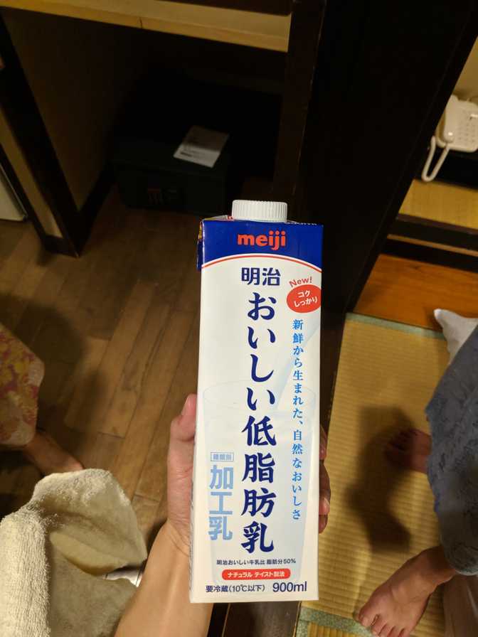 Enjoying some milk after bathing in the hotel onsen.