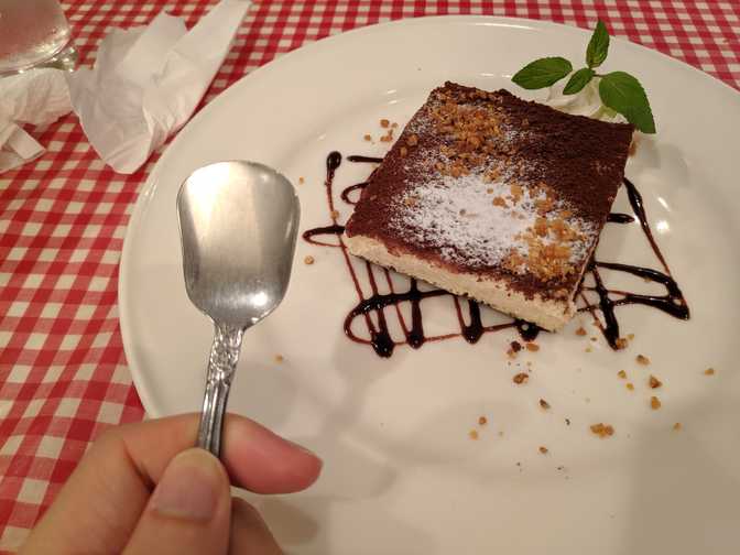 Tiramisu for dessert (where are the layers?). Not bad at all. This spoon was
weird and its shape allowed it to somehow get stuck in my teeth as I was pulling
it out.