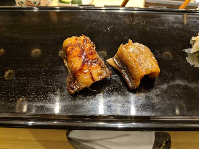 Anago (eel). Given as one half with sauce, and the other with salt. They
didn't blow my mind but I liked both.