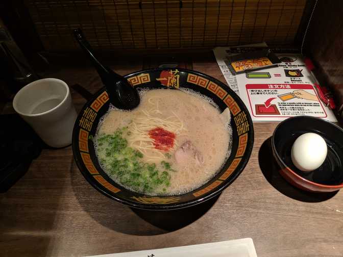 Ichiran ramen. You put that strange metal plate over the button behind the
bowl when you want your noodle refill. You pay for the refill, of course.