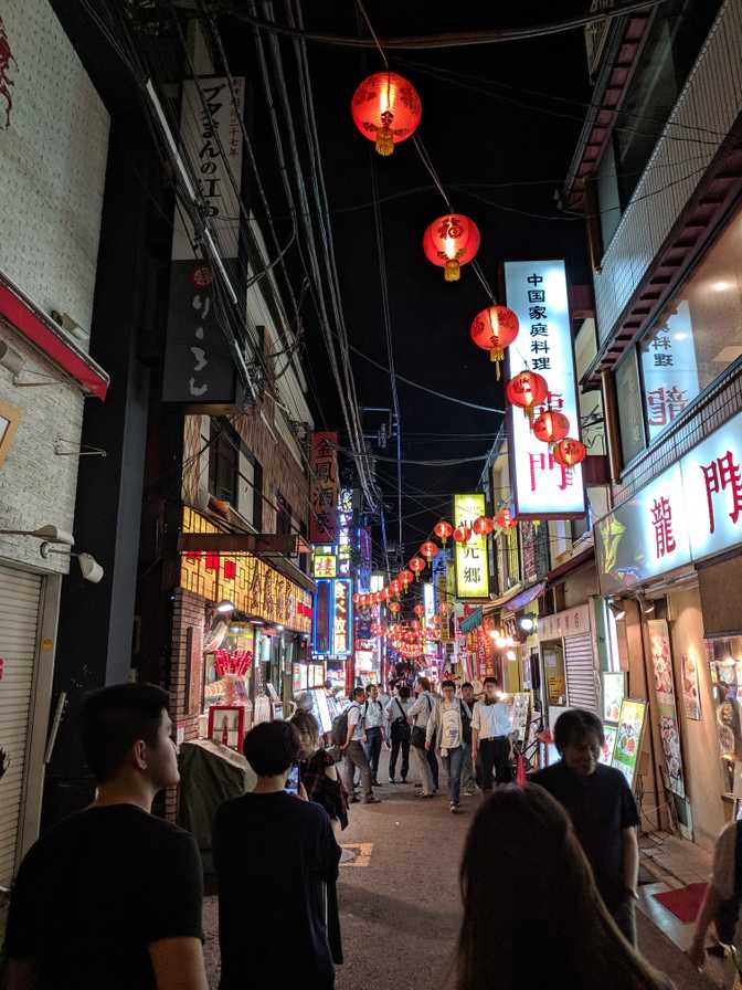 Another picture of a street, with drunk Japanese businessmen in the
background.