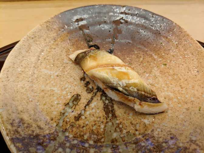 Anago (sea eel) with yuzu shavings. Sweet and melty. The yuzu was a good
addition.