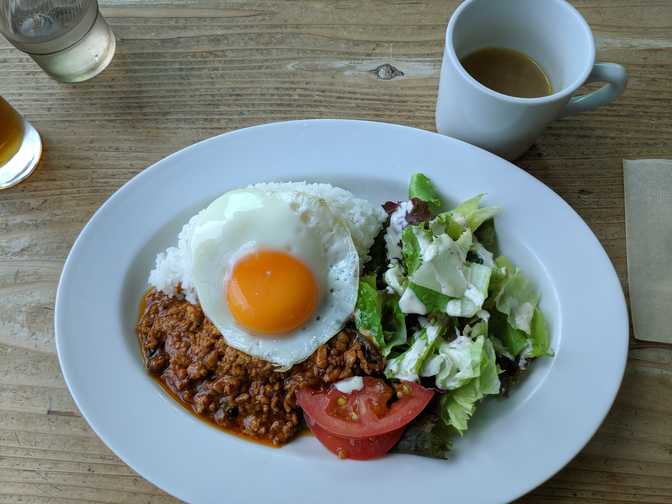 With some rice, salad and egg. The egg was perfectly done so that it wasn't
crusty on the other side, so it cut easily.