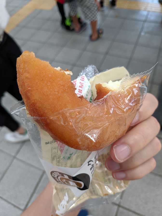 Harajuku JR station: expanding the stomach with a milk donut.