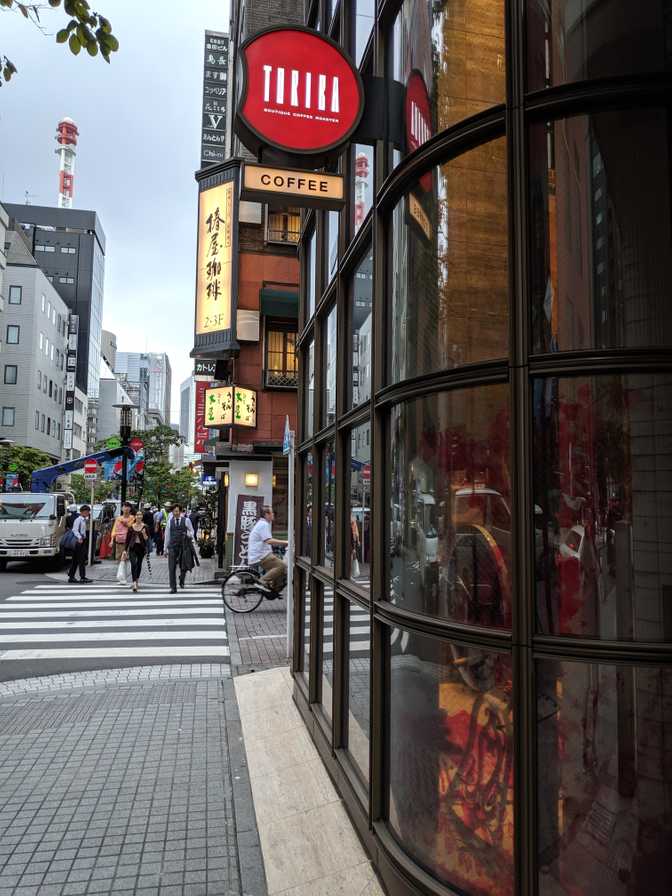 Toriba Coffee, Ginza: I spotted this one block down from Kyubey, and saw
that they had 100 JPY espresso/drip and 300 JPY cappuccino. Such a low price
would be a red flag but they also had a roastery upstairs so I thought that
it couldn't be that bad.