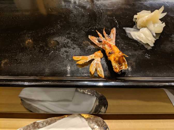 Deep fried prawn tail and head, presumably from the same prawn that I'd eaten
earlier. A surprise to be sure, but a welcome one.