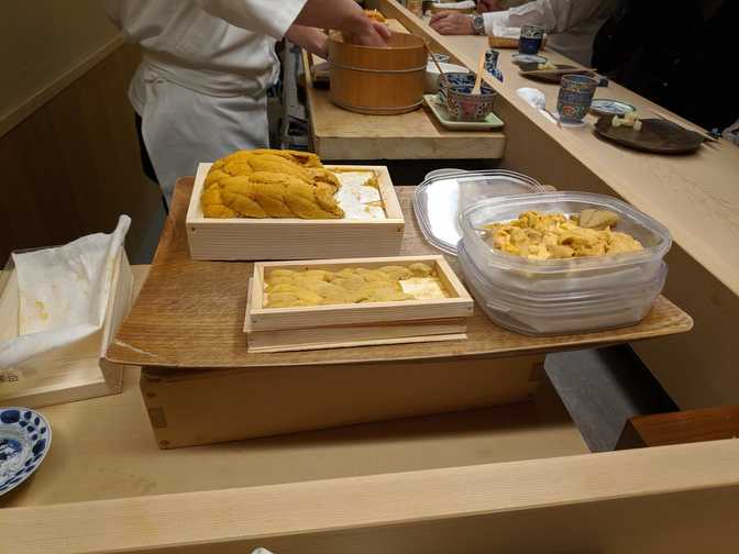 Hattori-san pulled out these boxes of different uni varieties and asked if we
wanted to order them. I wasn't sure how many more pieces we were getting so we
said something along the lines of "maybe later", but in hindsight, him asking
was probably a signal that our meal was coming to an end. We were starting to
get full at that point anyway.