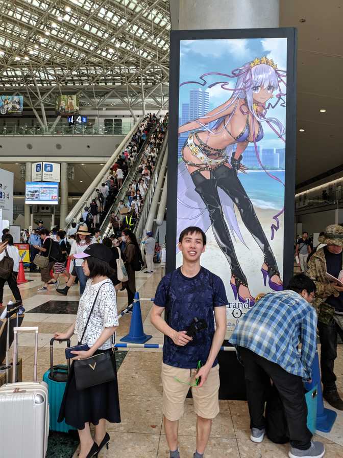 Comiket, Tokyo Big Sight, Odaiba: my only picture at Comiket since I spent
most of the time holding my gimbal. This picture doesn't really capture the
experience or how busy it was. The poster behind me would rank amongst the less
titillating things that I saw that day.