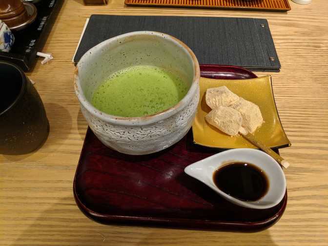 Matcha tea served with warabimochi, tea ceremony-ish style.