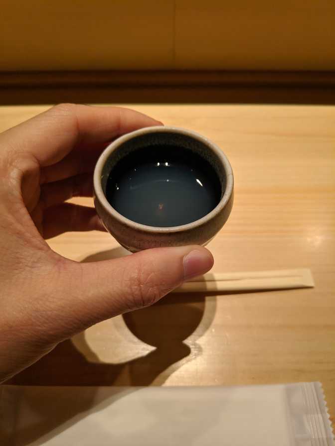 Manten Sushi, Marunouchi: a strange soup to start that had a dry taste.