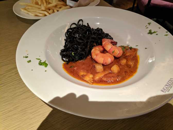 Squid ink taglioni. Texture was great and the prawns were sweet and fresh. A
bit too oily.