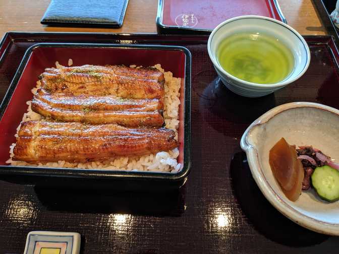 On the food level of Seibu, Ikebukuro: eel rice. The Japanese menu outside
looked like there were different varieties of eel with different costs, so I
was sad that I would probably have to look out for my wallet. However, the
English menu clarified that they were just different sizes of food, so I
guess they just used unconventional names to indicate the sizes. If you look
closely you can see the pepper on the eel, which the waitress kindly
sprinkled on for me after I asked what I was supposed to do. The eel was
amaaaaazing, it melted in my mouth every bite. I was also surprised again by
how the staff were in kimonos. I guess that's just a thing at eel
restaurants.