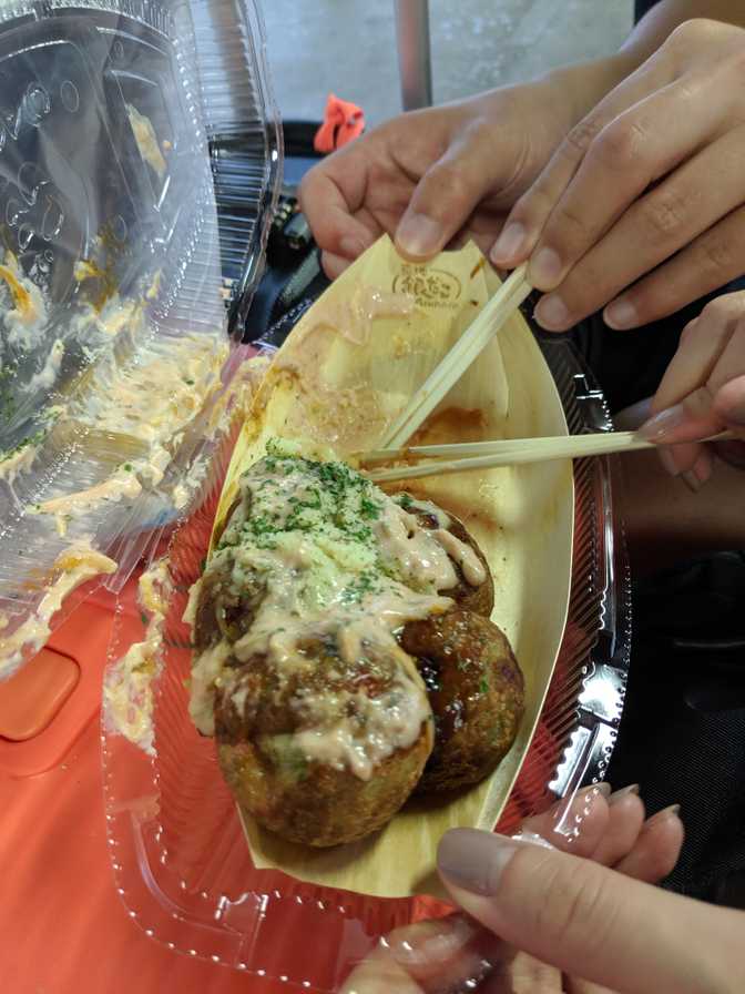 We boarded the train, then realised that it would take about an hour and we
wanted to eat our freshly bought takoyaki, so we got back off to eat it and
then caught the next one.