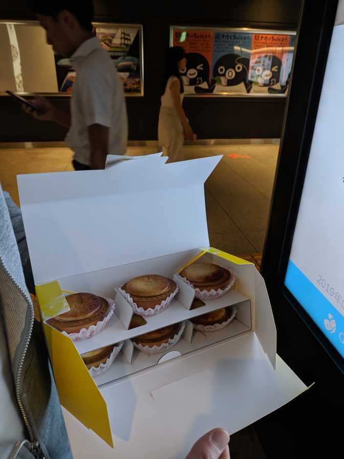 We got three chestnut and three original cheese flavour. We ate one each
before we got on the train to Akihabara.