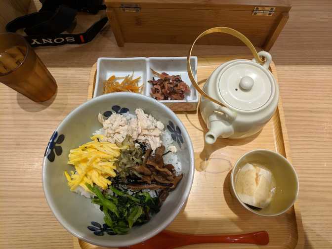 Some restaurant, Tokyo Midtown: dashi chazuke. You submerge your rice in soup
(from the teapot). Delicious, light meal.