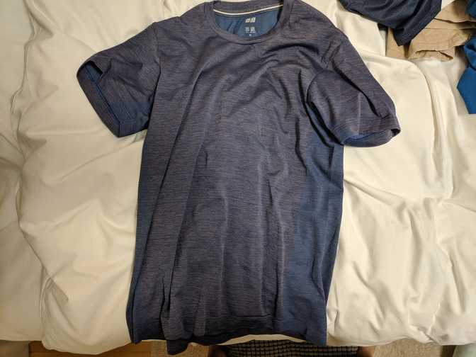 Uniqlo dry-ex t-shirt. I think this is the second generation of these t-shirts
which is why it looks different, and it feels thinner but more breathable. The
vents on the side make it look more like activewear.