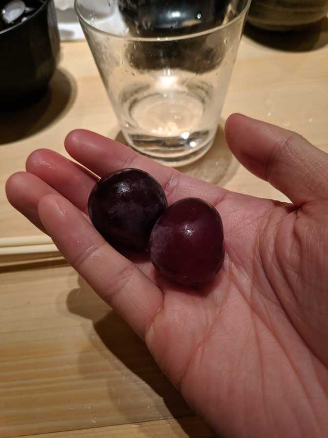 Some amazing grapes which were introduced as dessert. The guy next to me
left the skins for some reason, maybe that's the norm when eating big grapes
here?