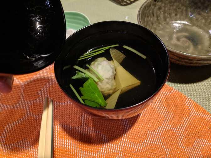 Meatball soup with tofu skin.