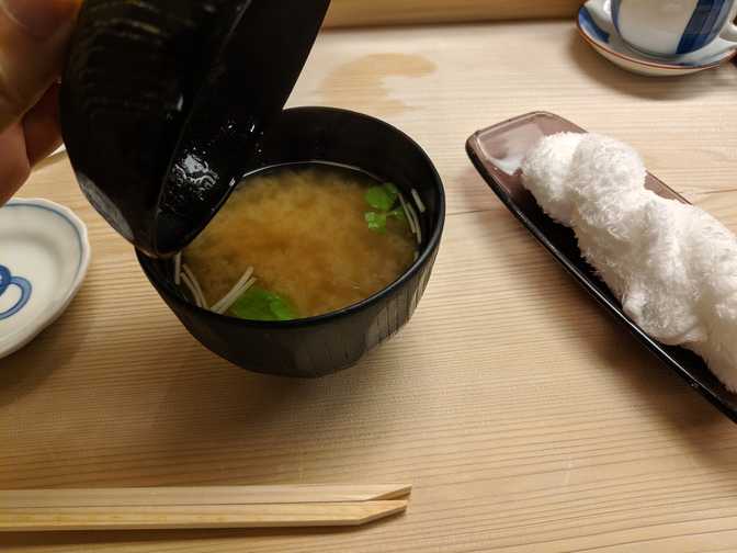 Miso soup that I ended up spilling half of. Also note the hot hand wrung
towel.